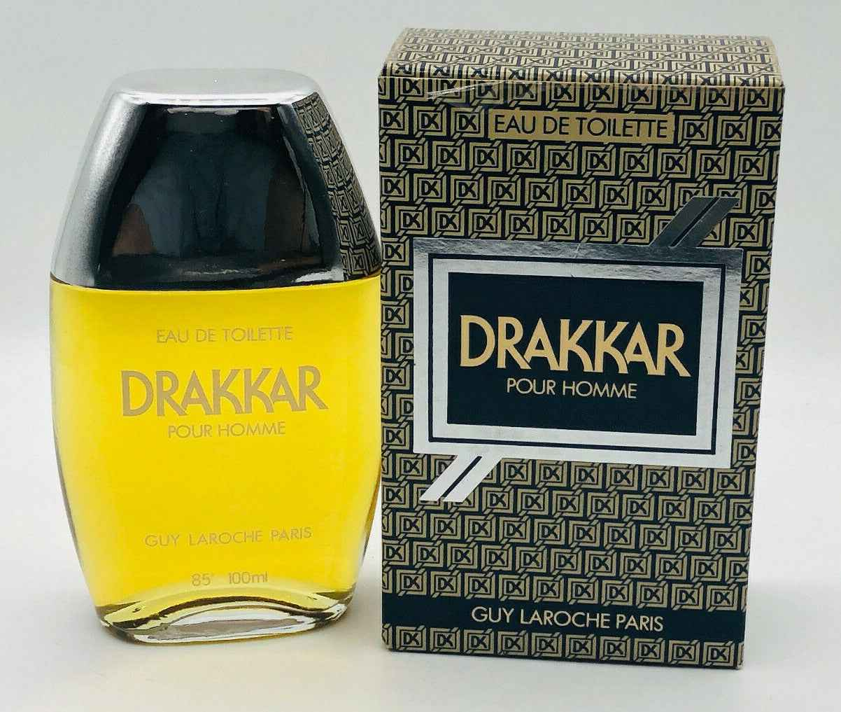 Profumo Drakkar Laroche Vintage in flacone giallo con confezione elegante dalla grafica nera e dorata