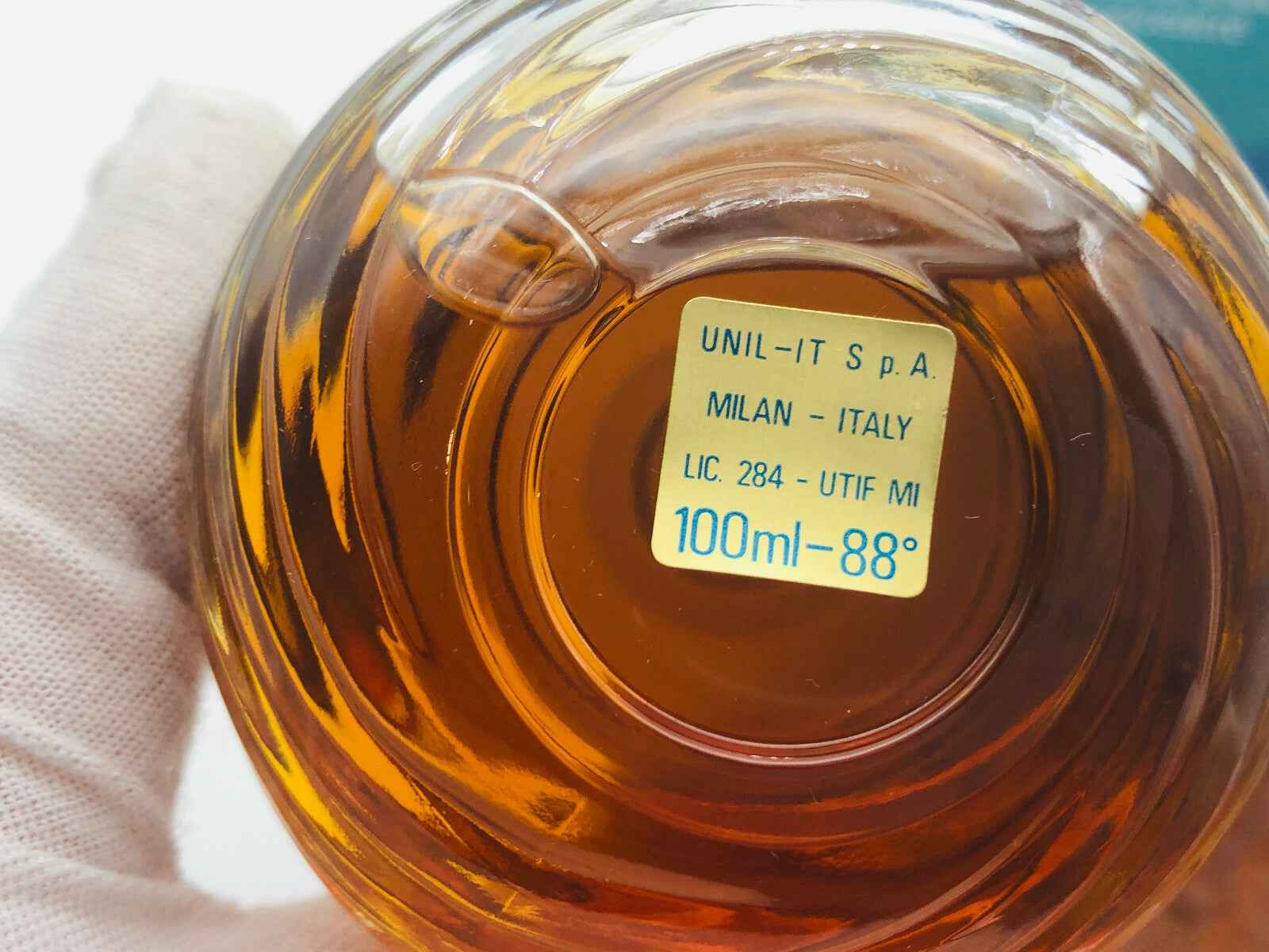 Bottiglia di Profumo Helietta Caracciolo Vintage con etichetta e liquido ambrato da 100ml