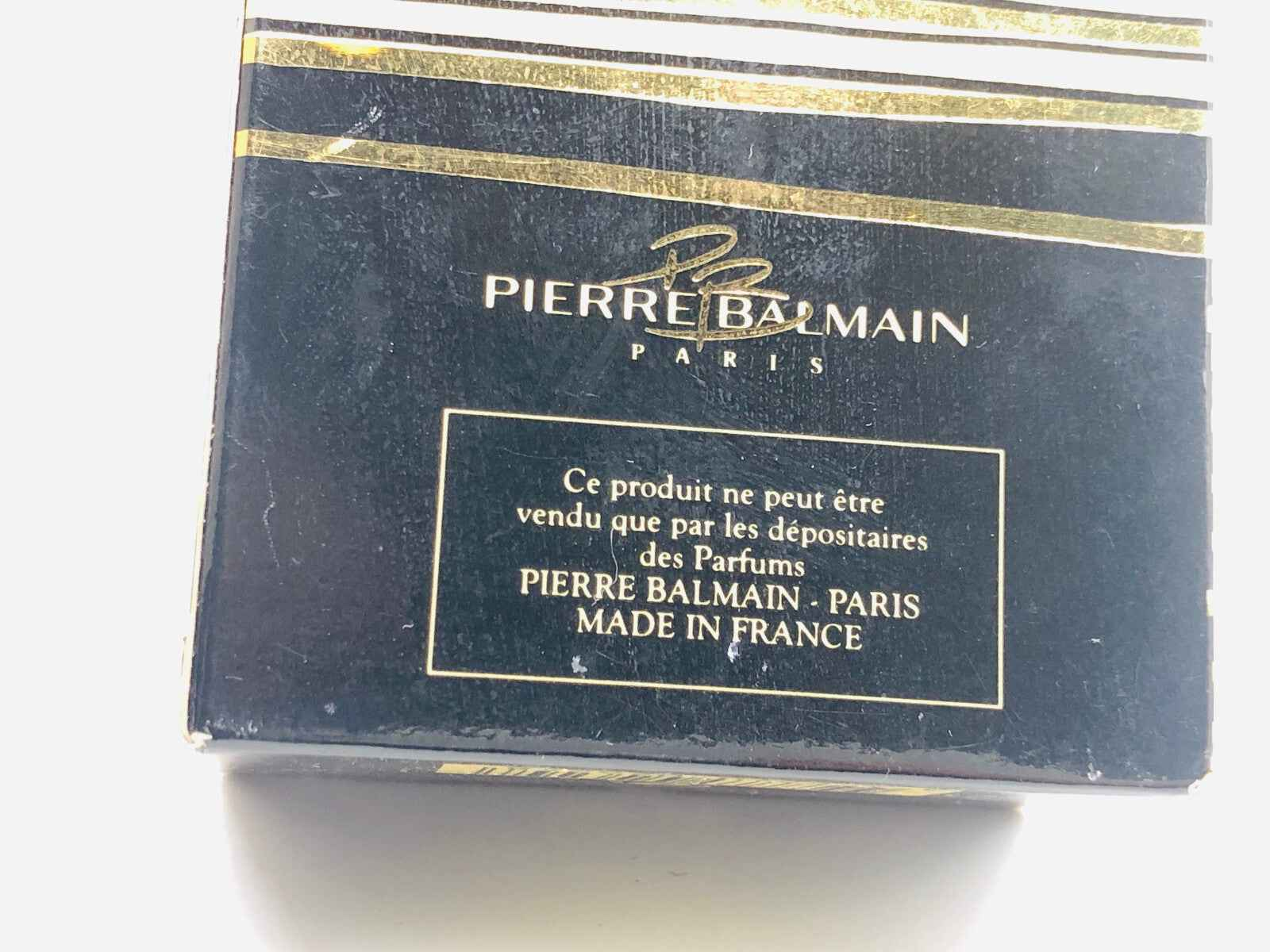 Confezione del profumo Ivoire De Balmain Vintage con design elegante e dettagli dorati