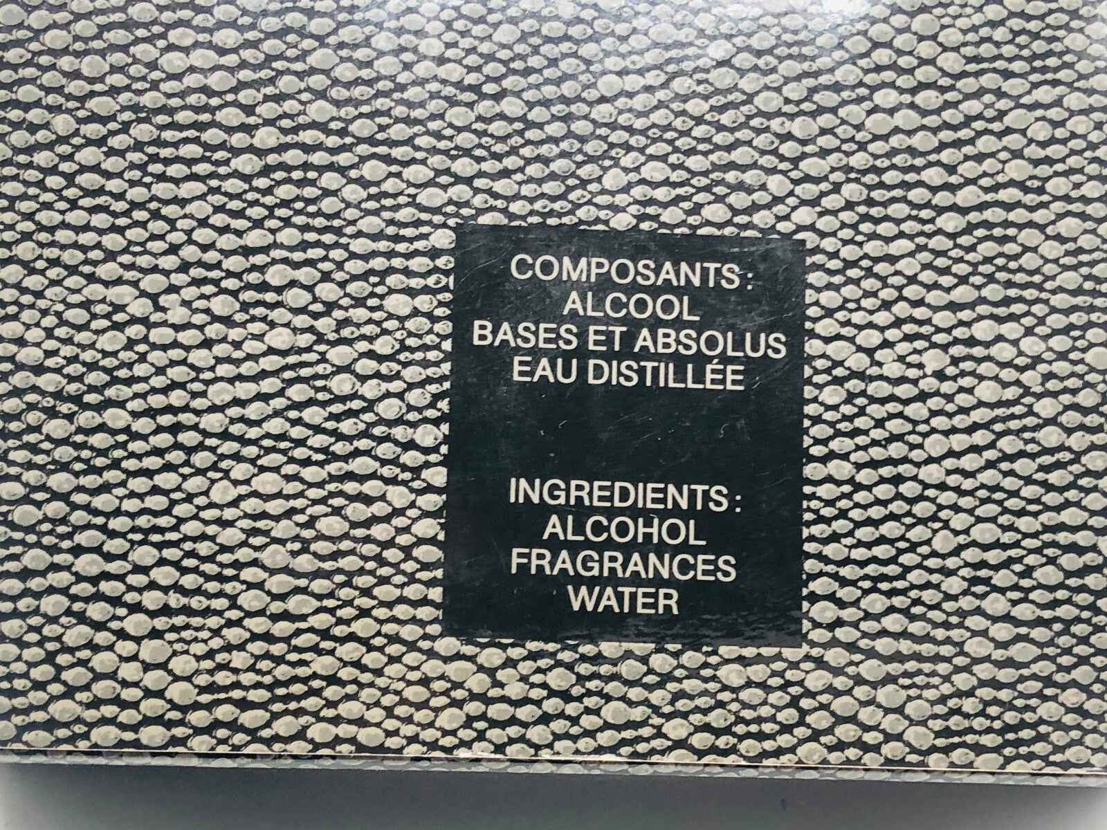 Scatola di profumo Jacomo Silences Vintage con ingredienti elencati su etichetta nera