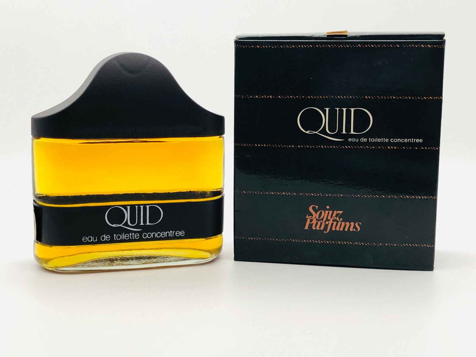 Profumo Quid Sojuz in flacone giallo con confezione elegante nera per un aroma distintivo