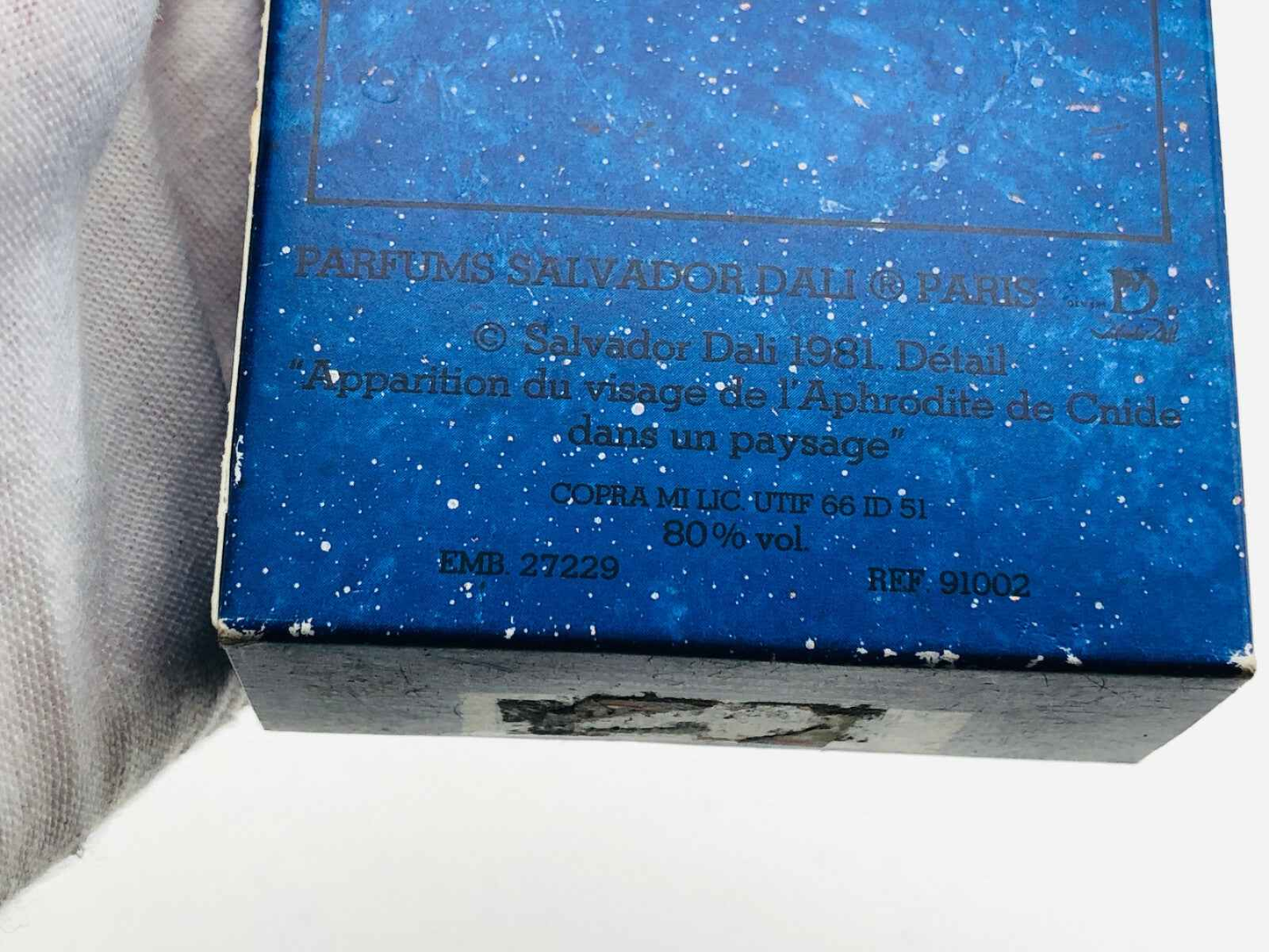 Scatola di profumo Salvador Dali con design blu e dettagli artistici del 1981