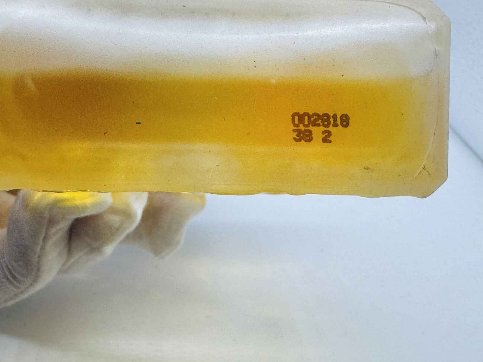 Flacone di profumo Salvador Dali Vintage con colore ambrato e design unico in alto rilievo