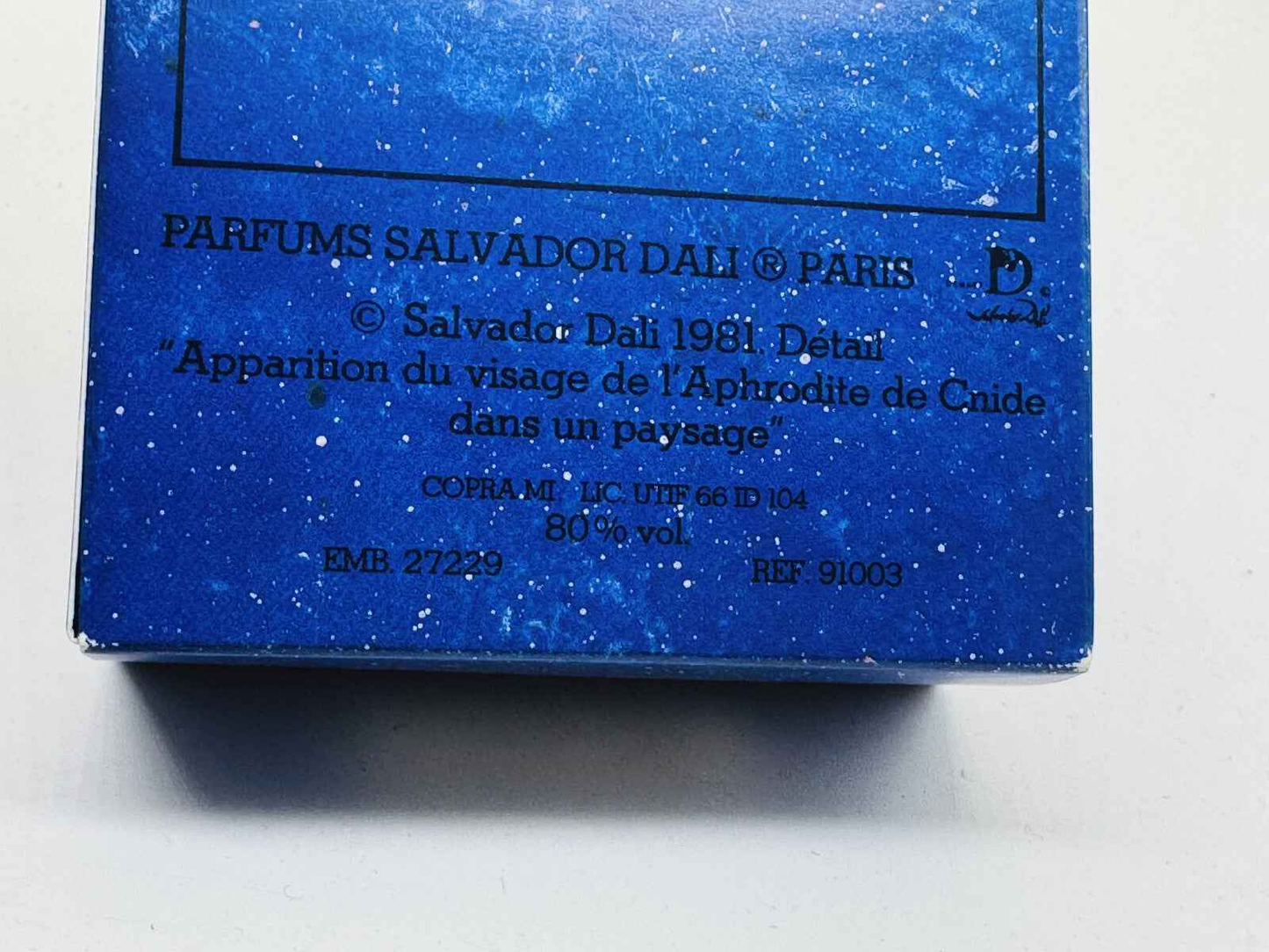 Scatola del profumo Salvador Dali Vintage con dettagli artistici e design blu