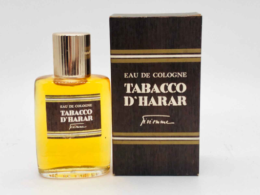 Profumo Tabacco D Harar in flacone di cologne con confezione in legno marrone per un aroma unico