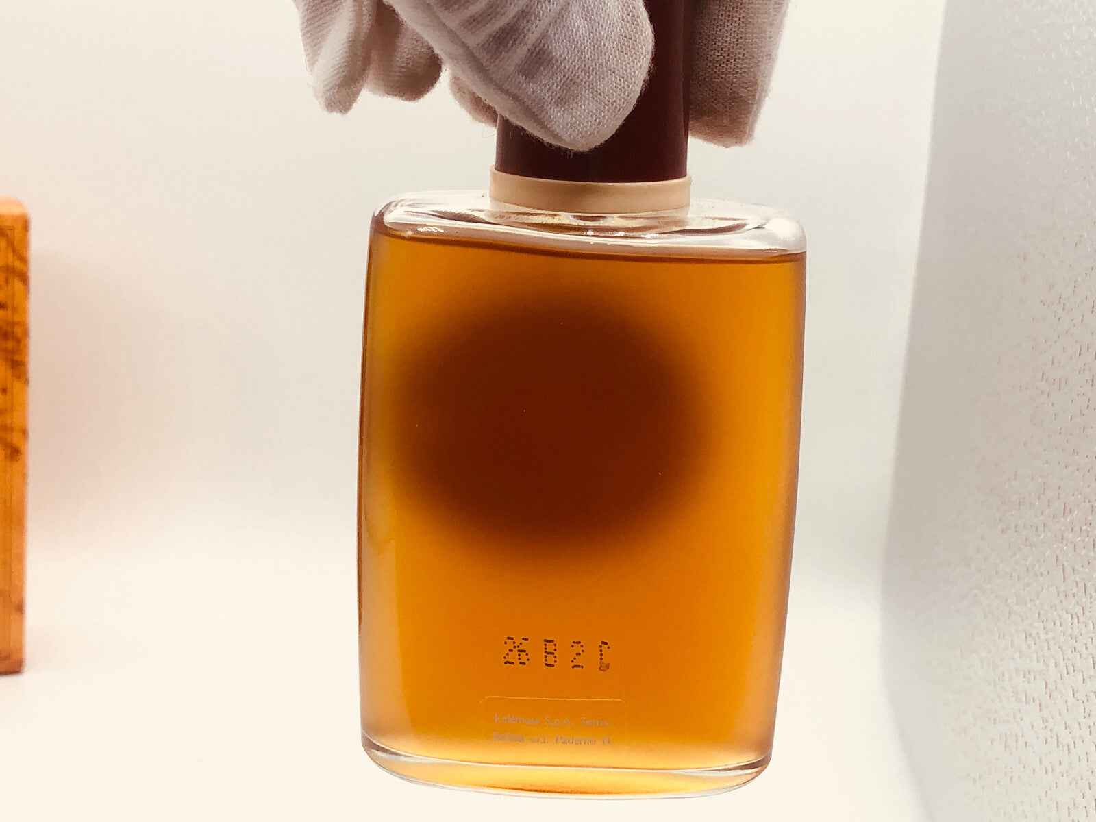 Flacone di profumo Tabacco Harar Vintage con tonalità ambrata e tappo elegante