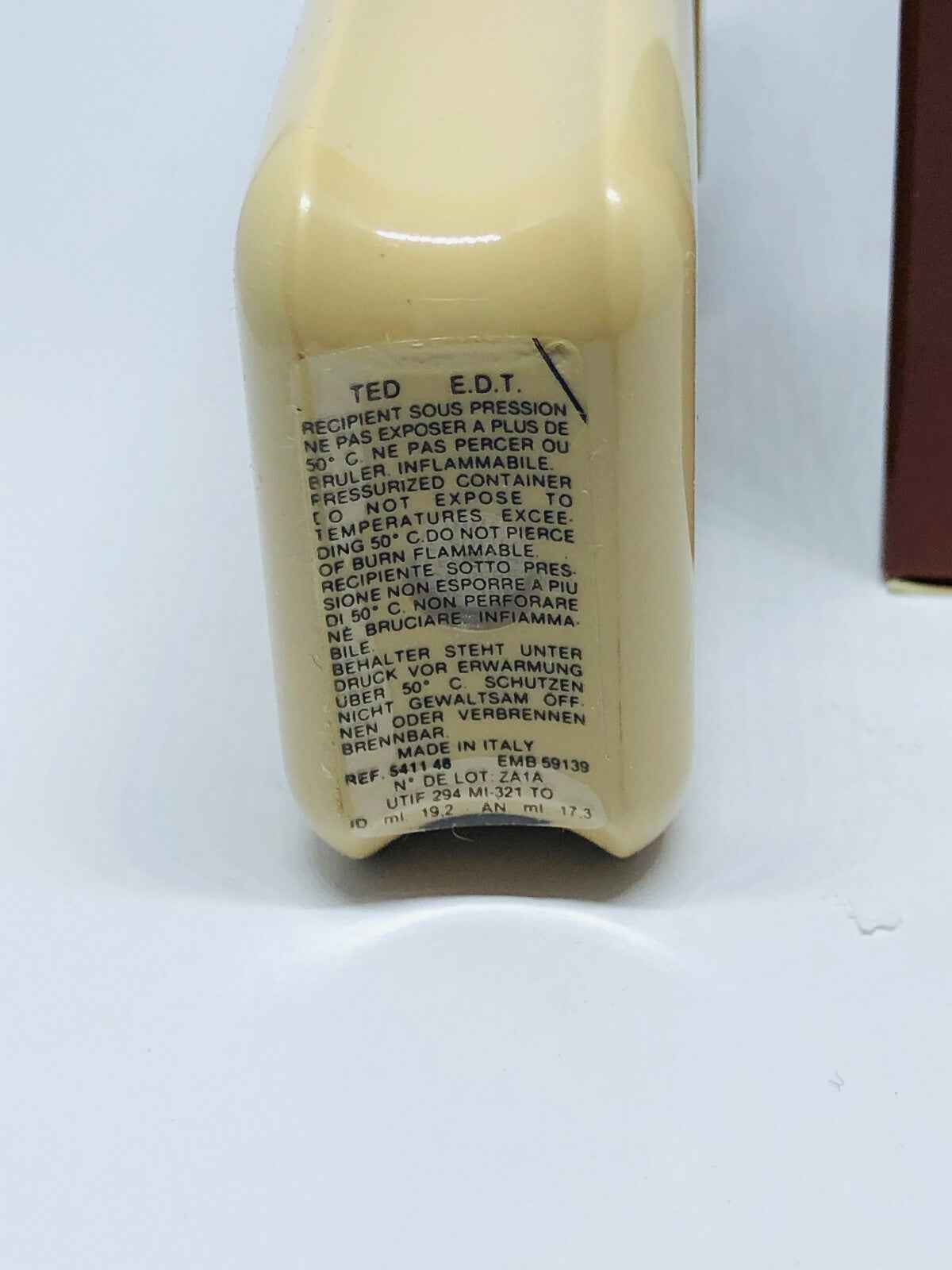 Flacone di profumo Ted Lapidus Vintage con etichetta dettagliata sul retro dell'imballaggio