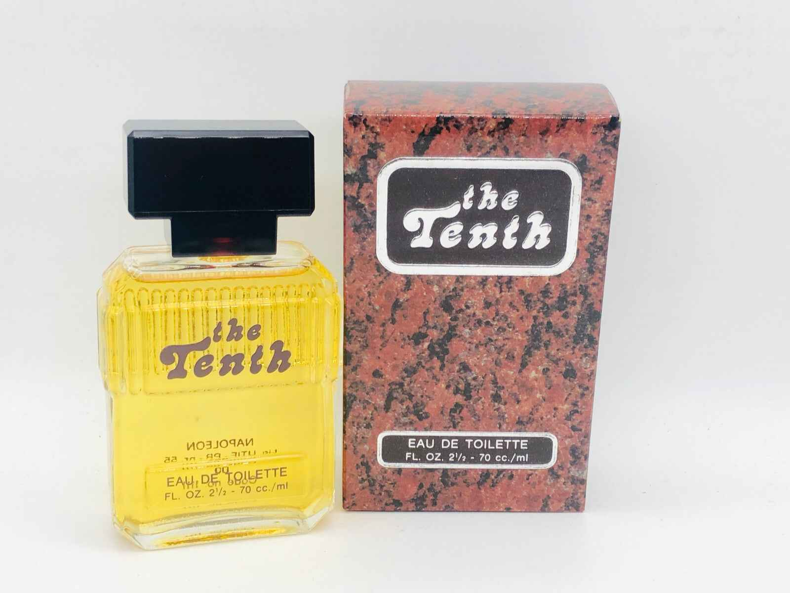 Profumo The Tenth Napoleon Vintage in bottiglia gialla con confezione rossa e nera