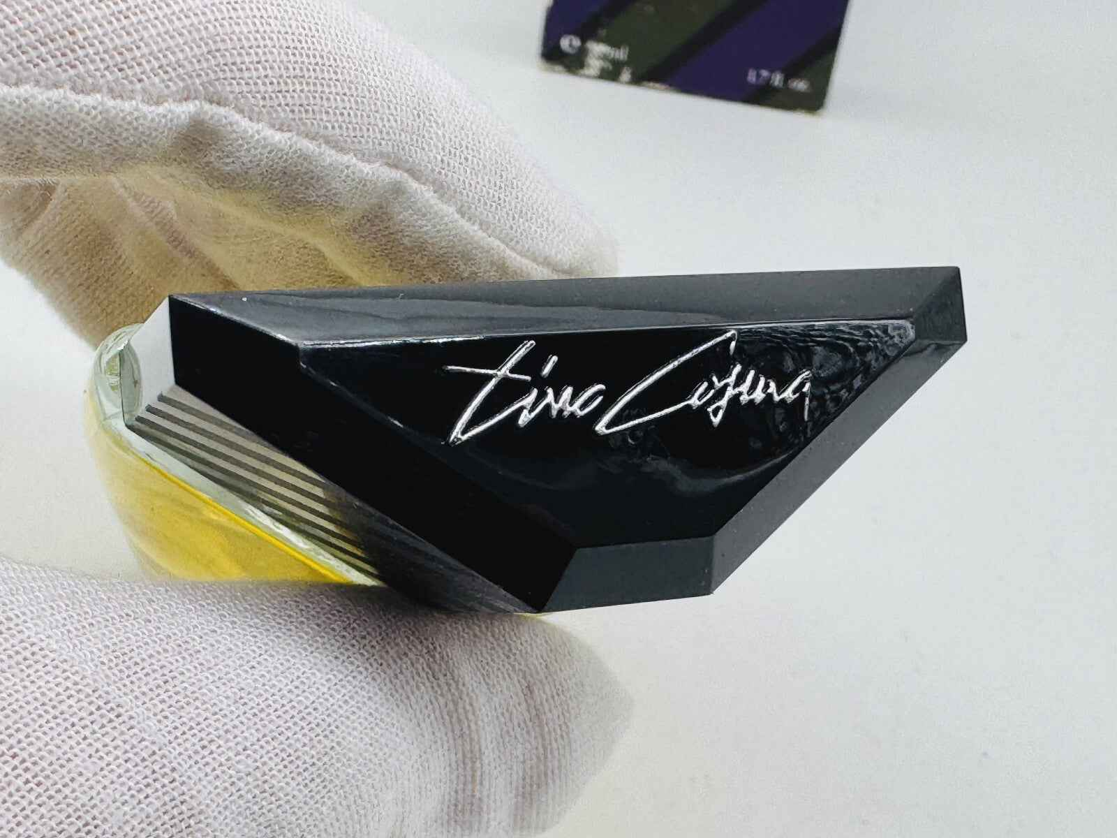 Flacone di profumo Tino Cosma Vintage con design elegante e logo distintivo