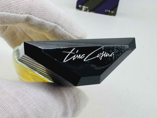 Flacone di profumo Tino Cosma Vintage con design elegante e logo distintivo