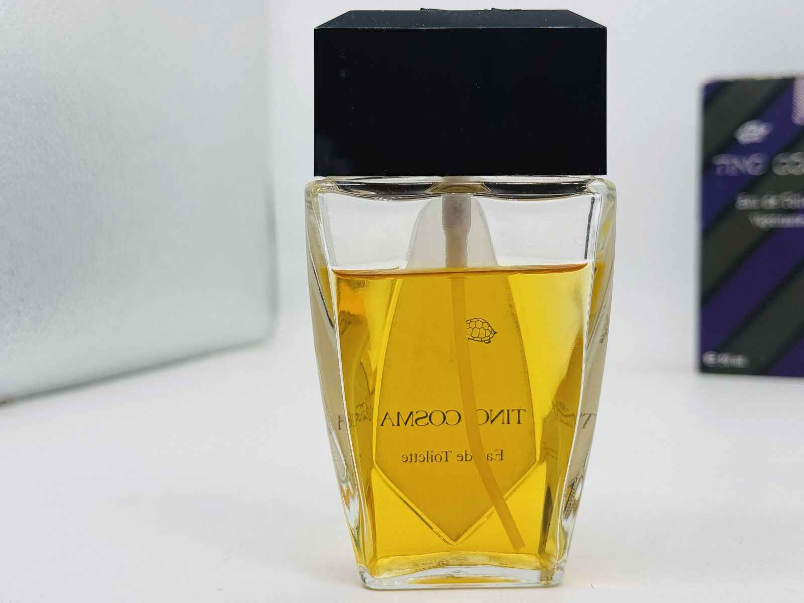 Flacone di profumo Tino Cosma Vintage con elegante design e fragranza sofisticata