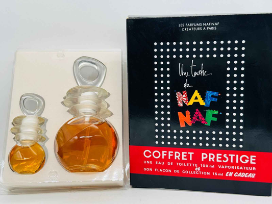 Cofanetto Prestige con profumo Un Touche Naf Naf, include flaconi da 100 ml e 15 ml in elegante confezione