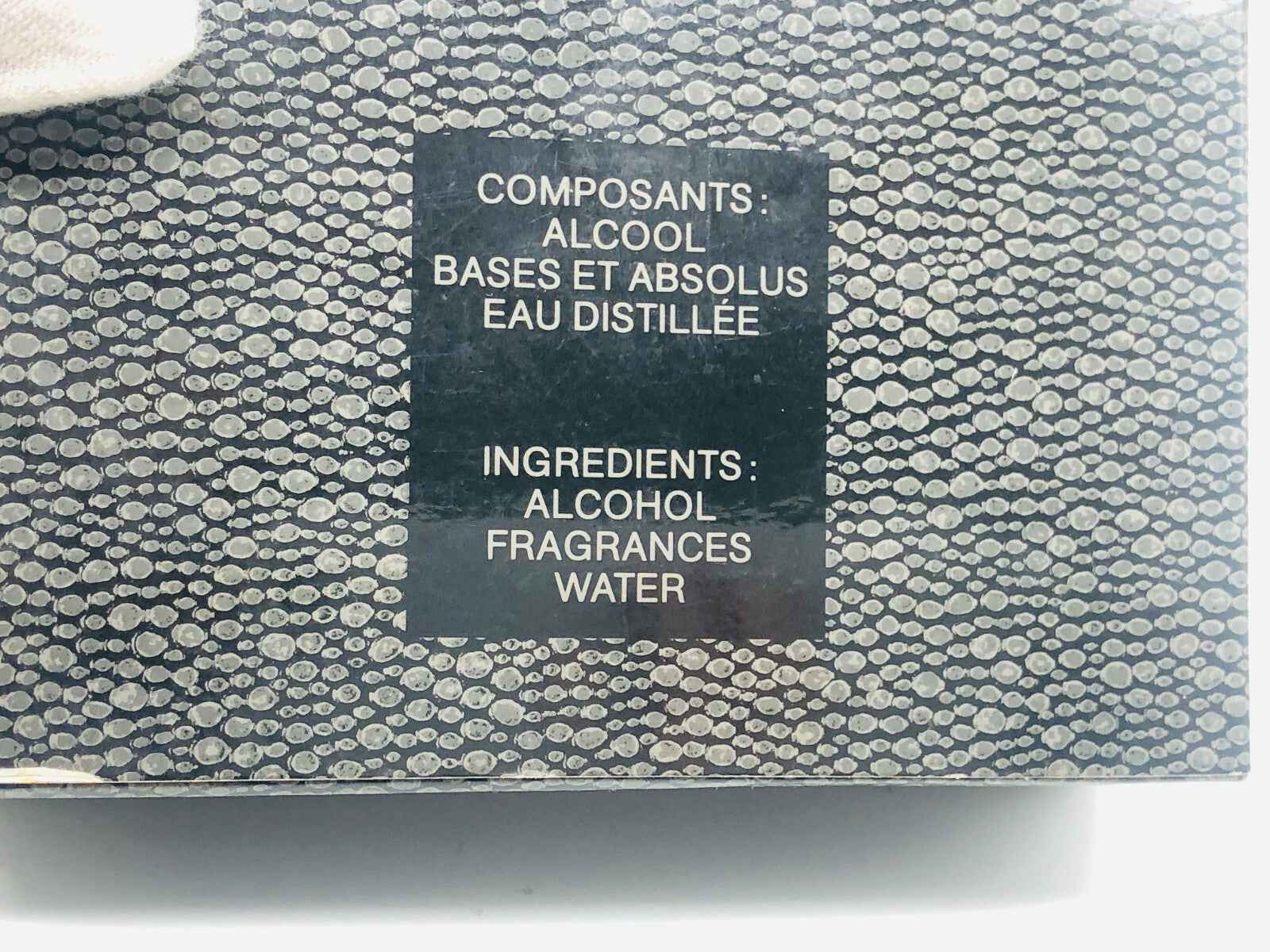 Etichetta di ingredienti per il profumo Vintage Jacomo Silences che elenca alcol, fragranze e acqua