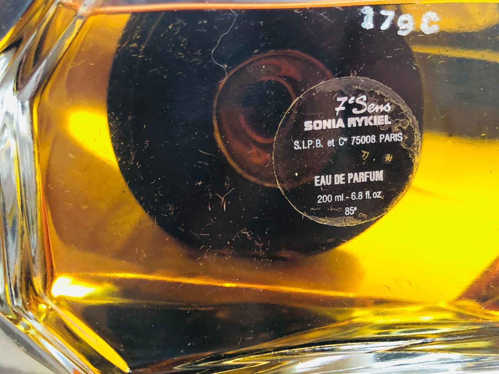 Flacone di profumo vintage Sonia Rykiel da 200 ml con etichetta elegante e tinta dorata