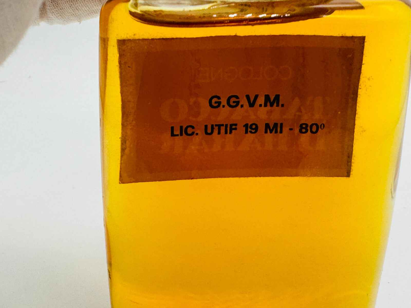 Flacone di Profumo Vintage Tabacco con etichetta G.G.V.M. e tonalità dorata
