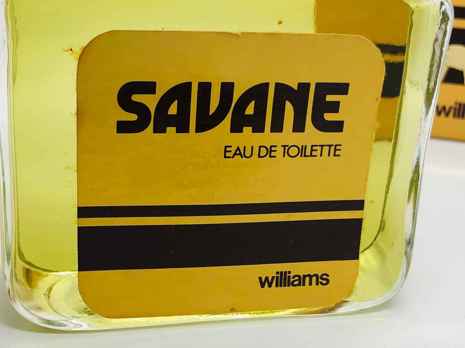 Flacone di Profumo Williams Savane con etichetta gialla e trasparente, Eau de Toilette