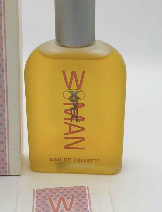 Profumo Xpec Woma in bottiglia di eau de toilette con etichetta colorata e design elegante
