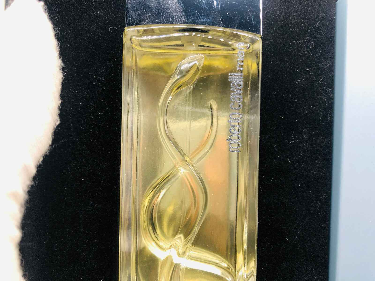 Profumo Roberto Cavalli Man in bottiglia elegante con design moderno e tonalità dorata