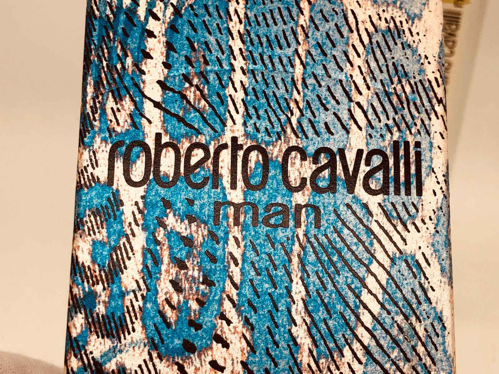 Scatola del profumo Roberto Cavalli Man con design rettile blu e marrone