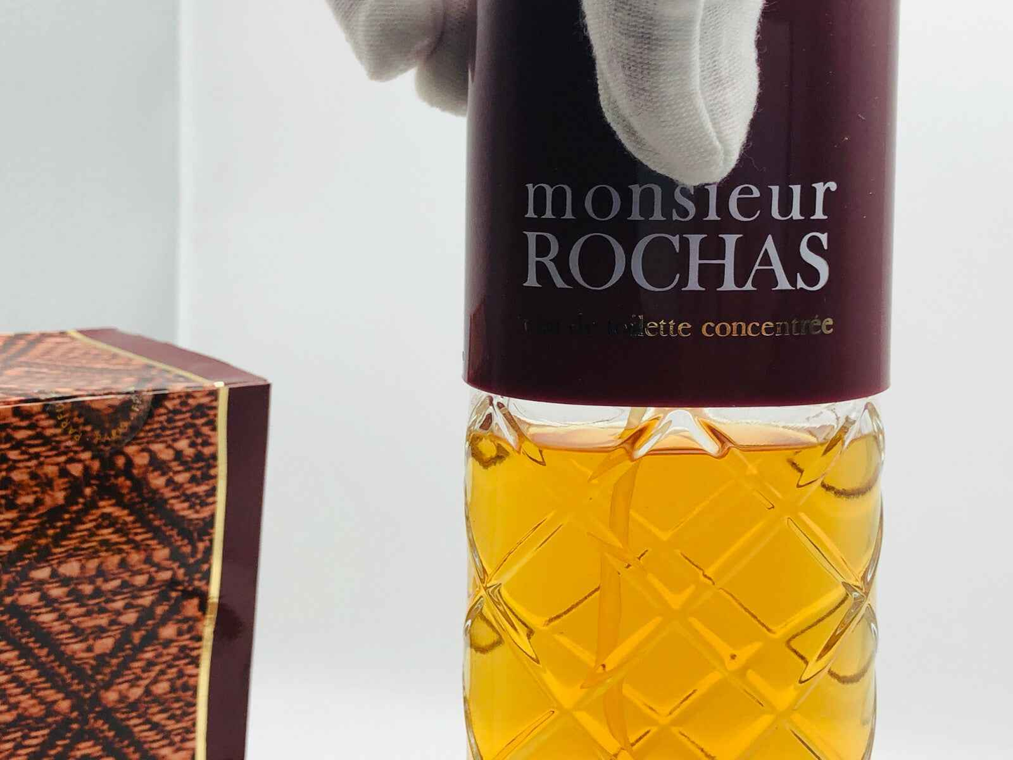 Profumo Rochas Monsieur Vintage in flacone elegante con tonalità ambrata e confezione distintiva