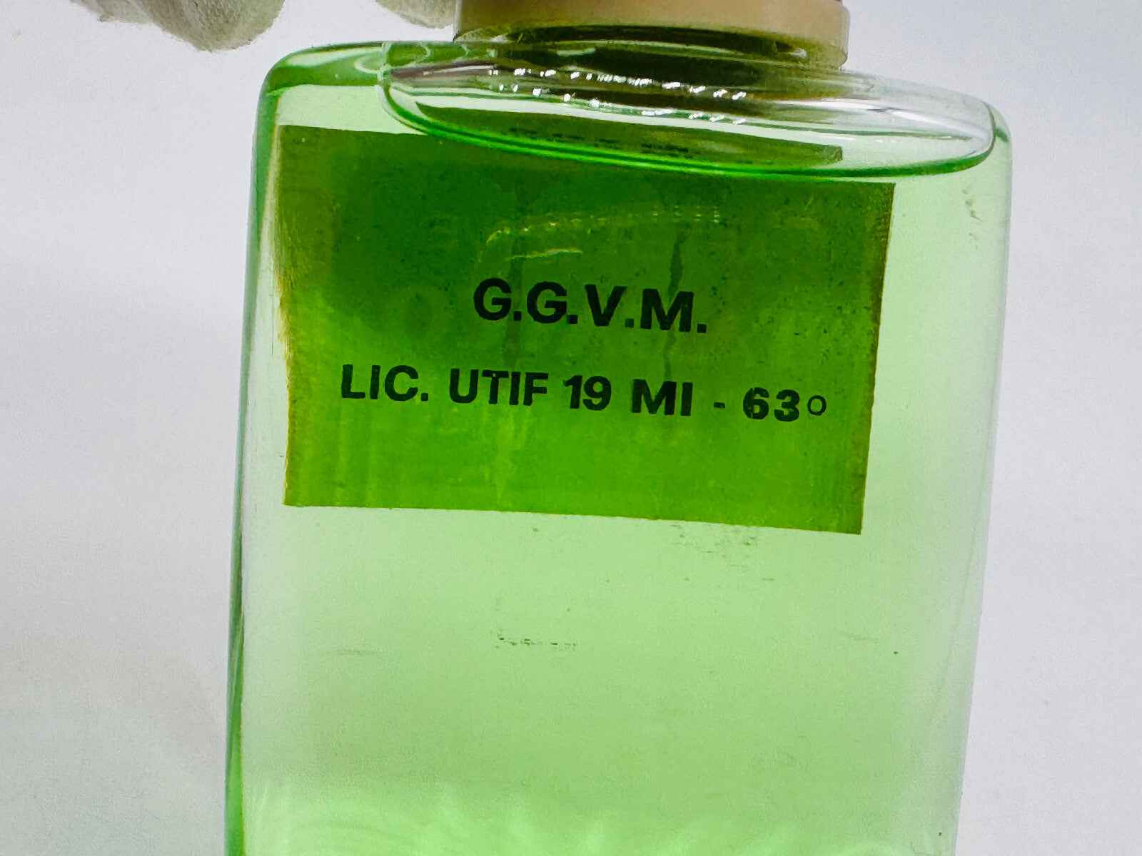 Flacone di Tabacco D'Harar Giviemme con etichetta verde e chiusura a tappo