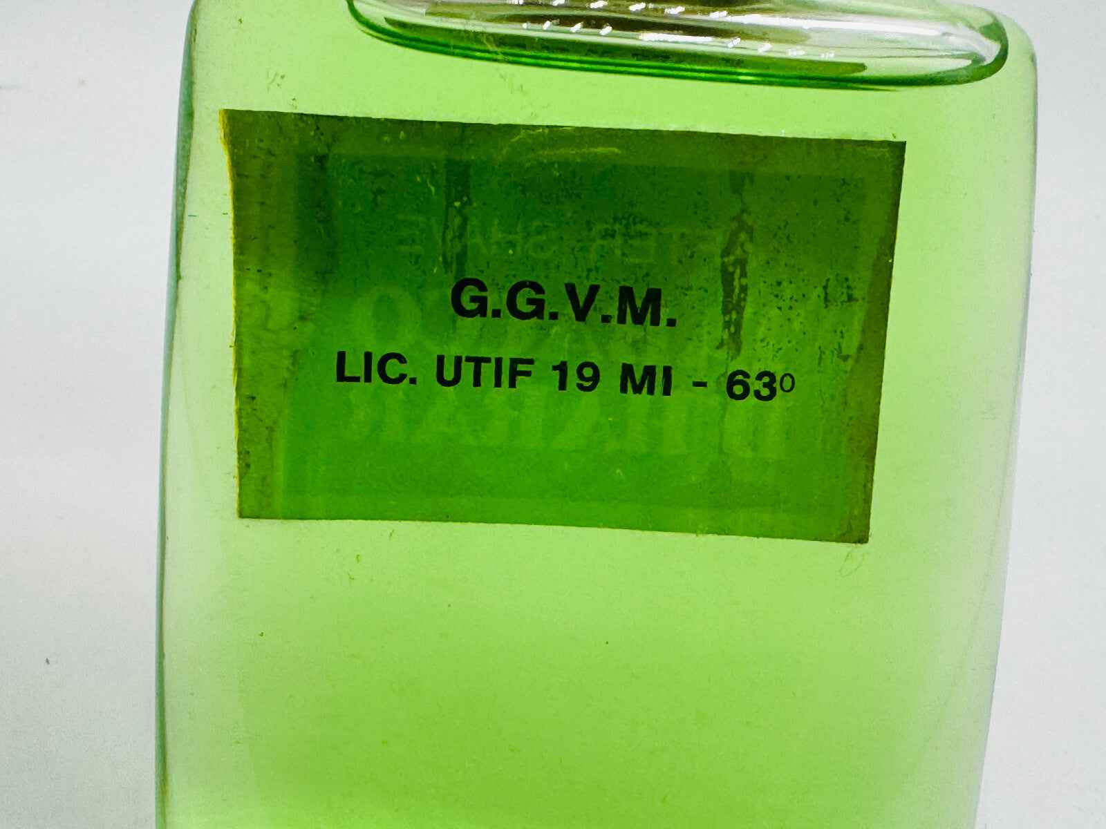 Bottiglia verde di Tabacco D'Harar Vintage firmata GIVIEMME con etichetta distintiva