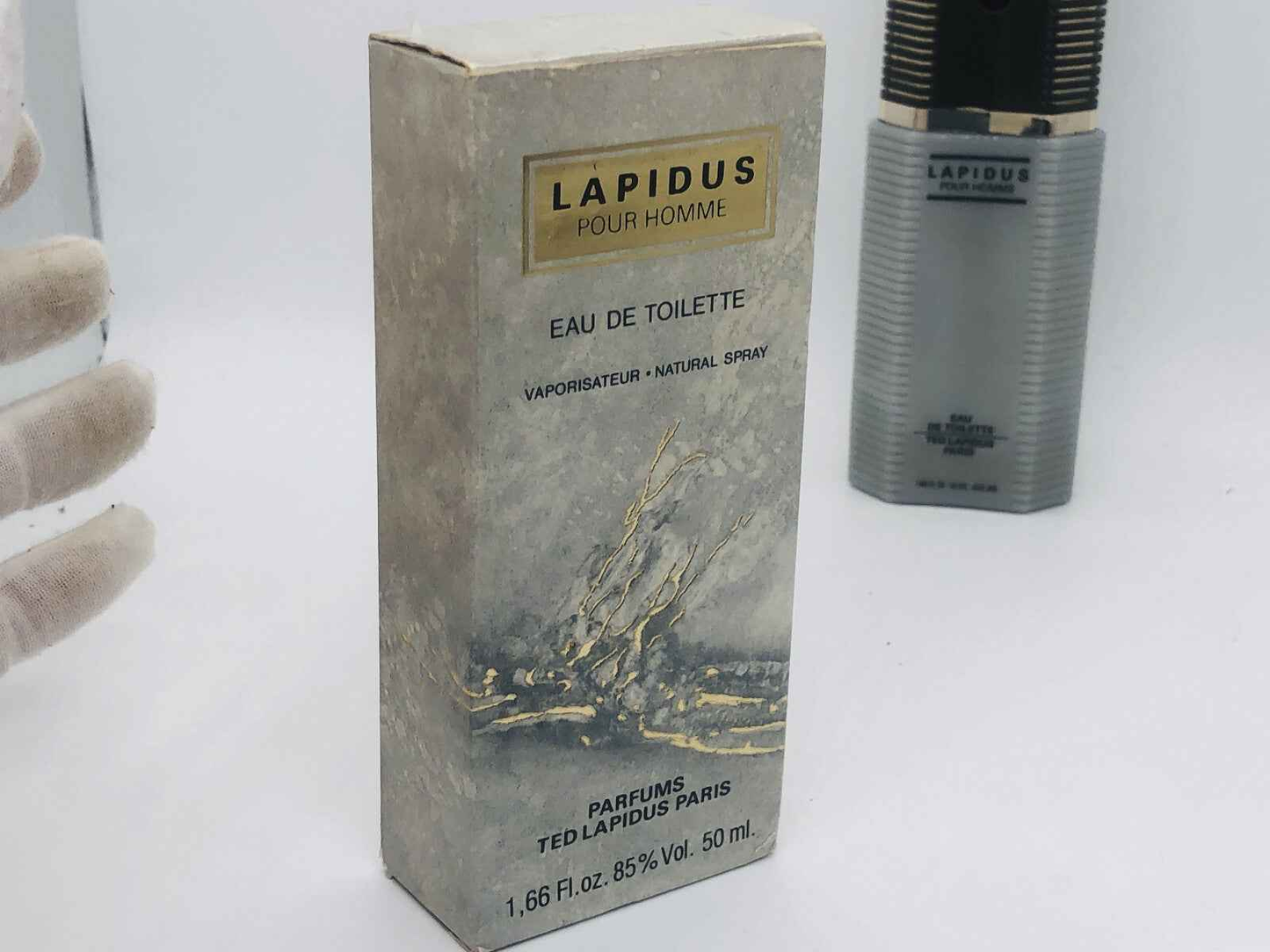 Scatola di Ted Lapidus Pour Homme Eau de Toilette 50 ml con design elegante e dettagli dorati