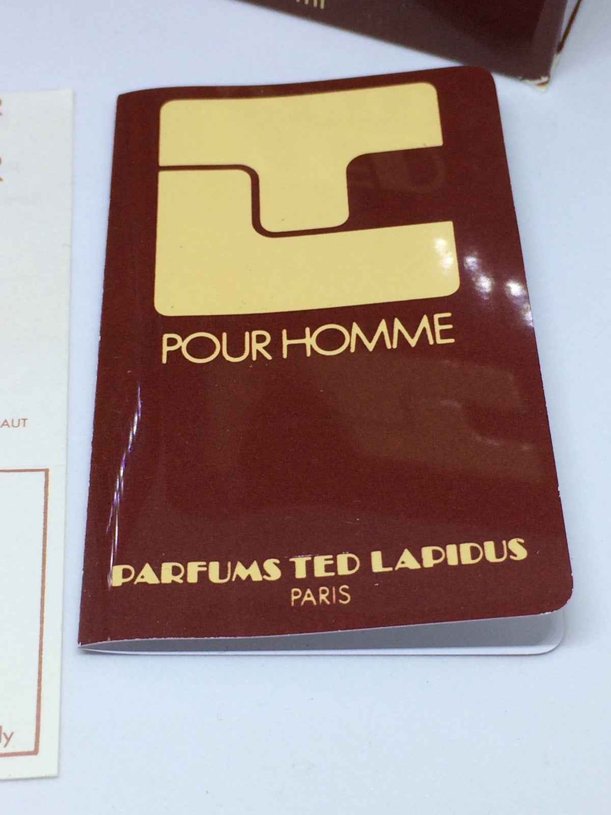 Campione del profumo Ted Lapidus Pour Homme in confezione elegante con design vintage
