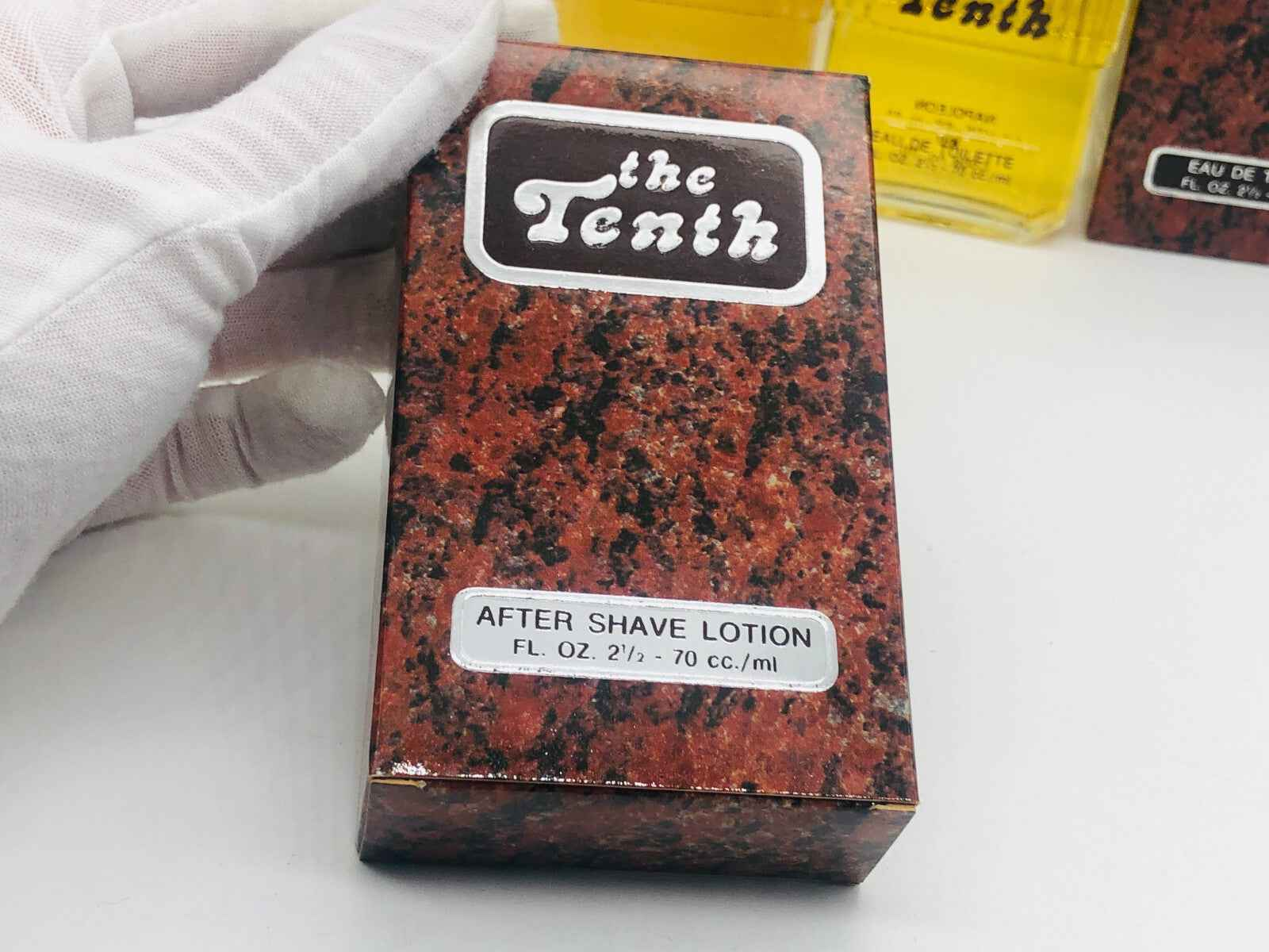 The Tenth Napoleon Vintage After Shave Lotion in a stylish marble-patterned box