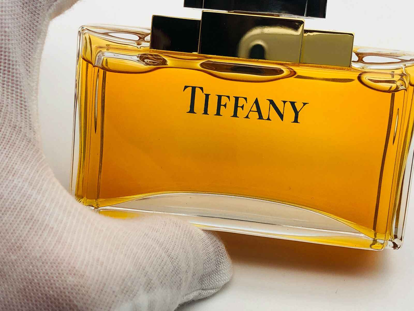 Flacone di profumo Tiffany Vintage Donna con design elegante e colore ambrato