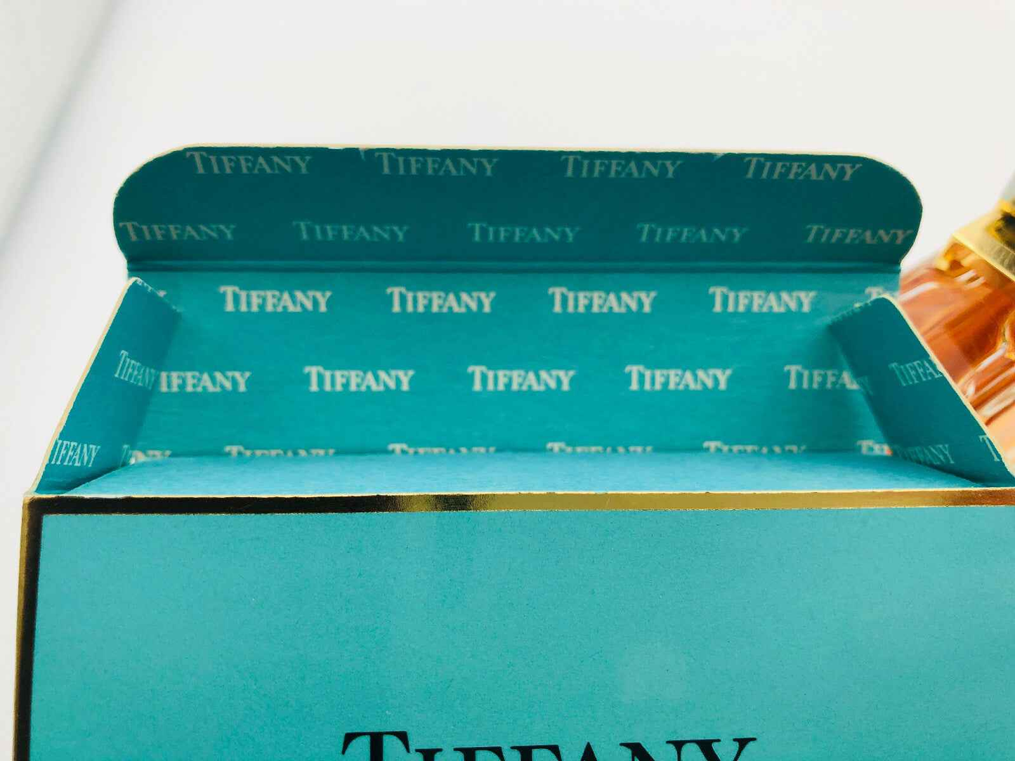 Scatola di profumo Tiffany Vintage Donna con logo Tiffany in eleganti tonalità di blu e oro