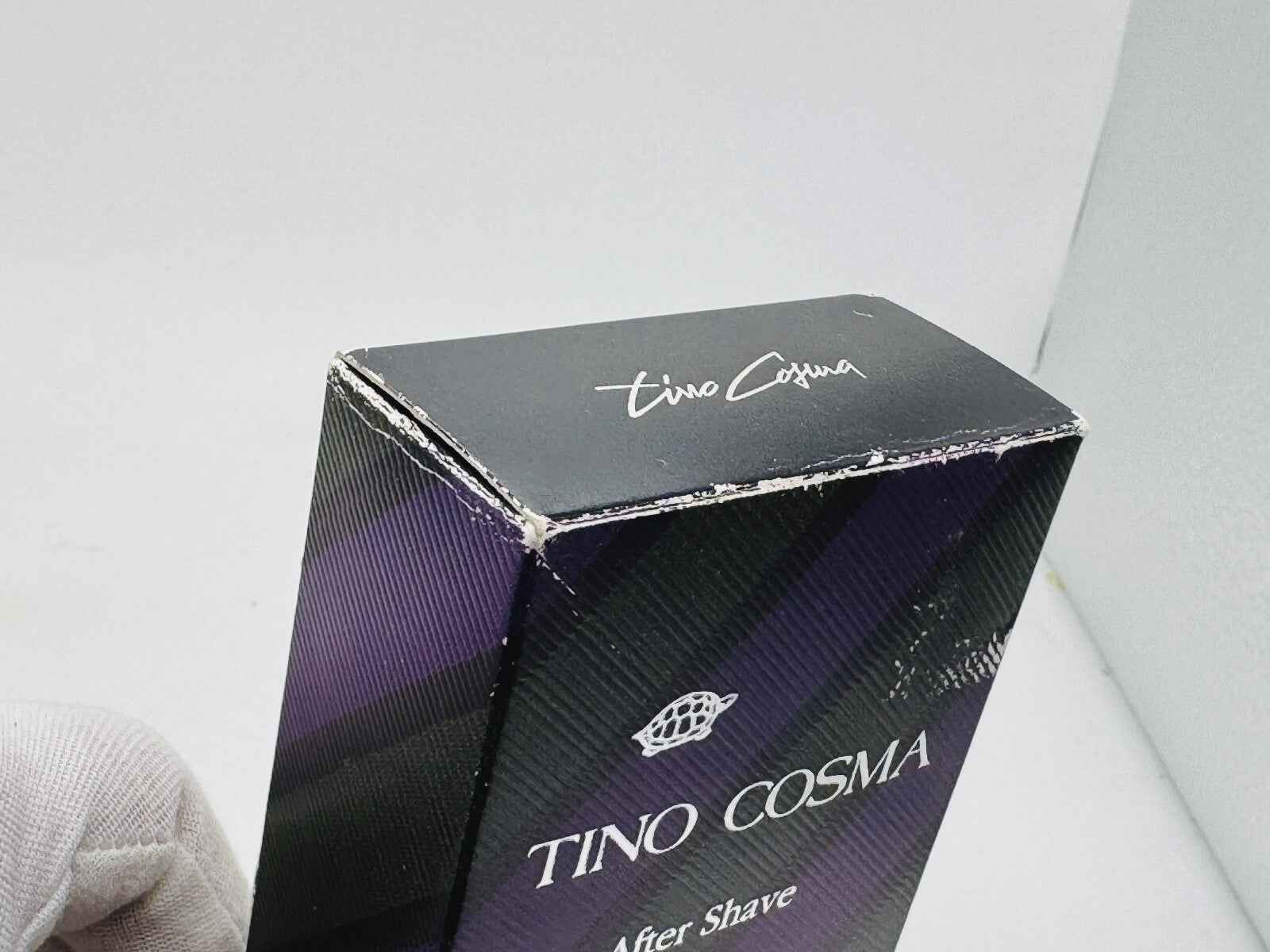 Scatola di Tino Cosma Uomo Vintage dopo barba con design elegante in viola e nero