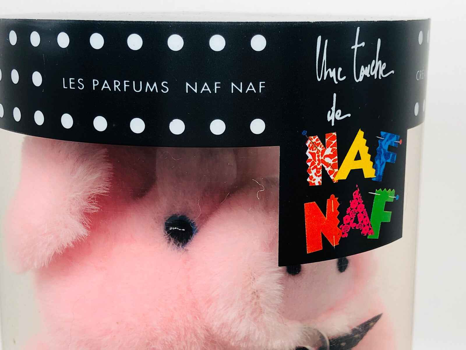 Profumo vintage Un Touche Naf Naf in contenitore con design colorato e morbido peluche rosa