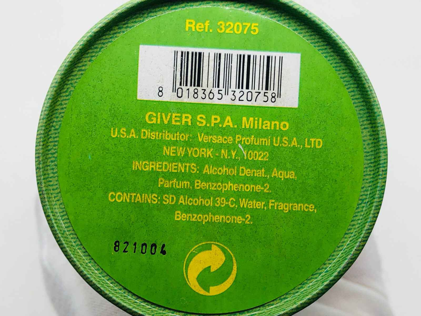 Profumo Versace Green Jeans con ingredienti dettagliati su etichetta eco-compatibile