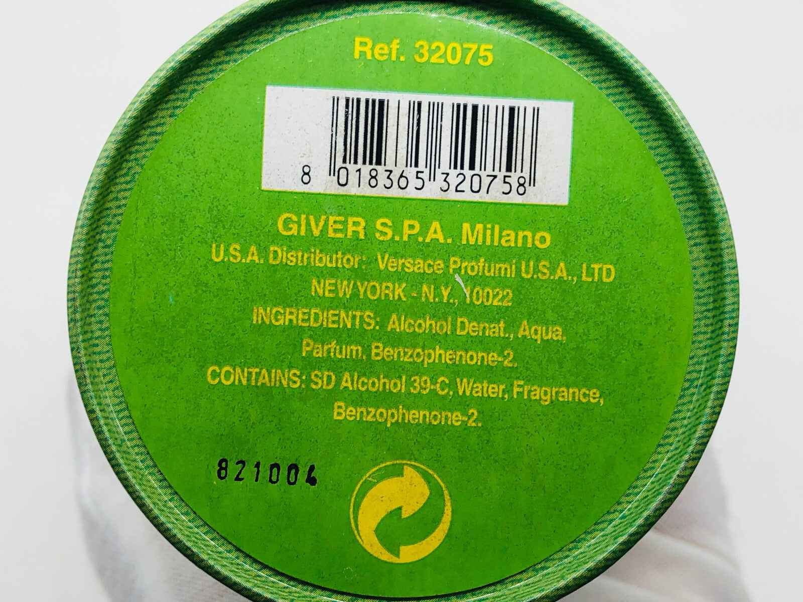 Profumo Versace Green Jeans con ingredienti dettagliati su etichetta eco-compatibile