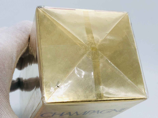 Confezione del profumo Champagne Ysl Vintage con finitura dorata e design elegante