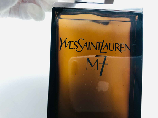 Profumo M7 Ysl Vintage in bottiglia marrone con etichetta elegante di Yves Saint Laurent