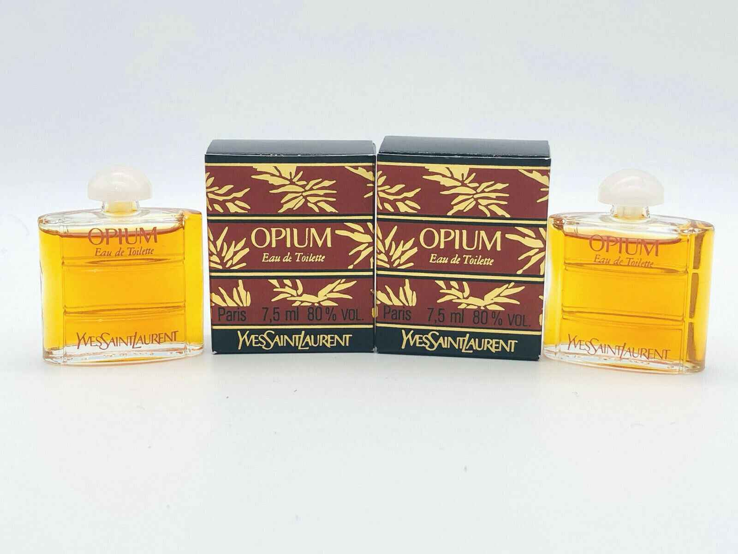 Due flaconi di profumo Opium Ysl Vintage da 7,5 ml ciascuno con scatola originale in stile classico
