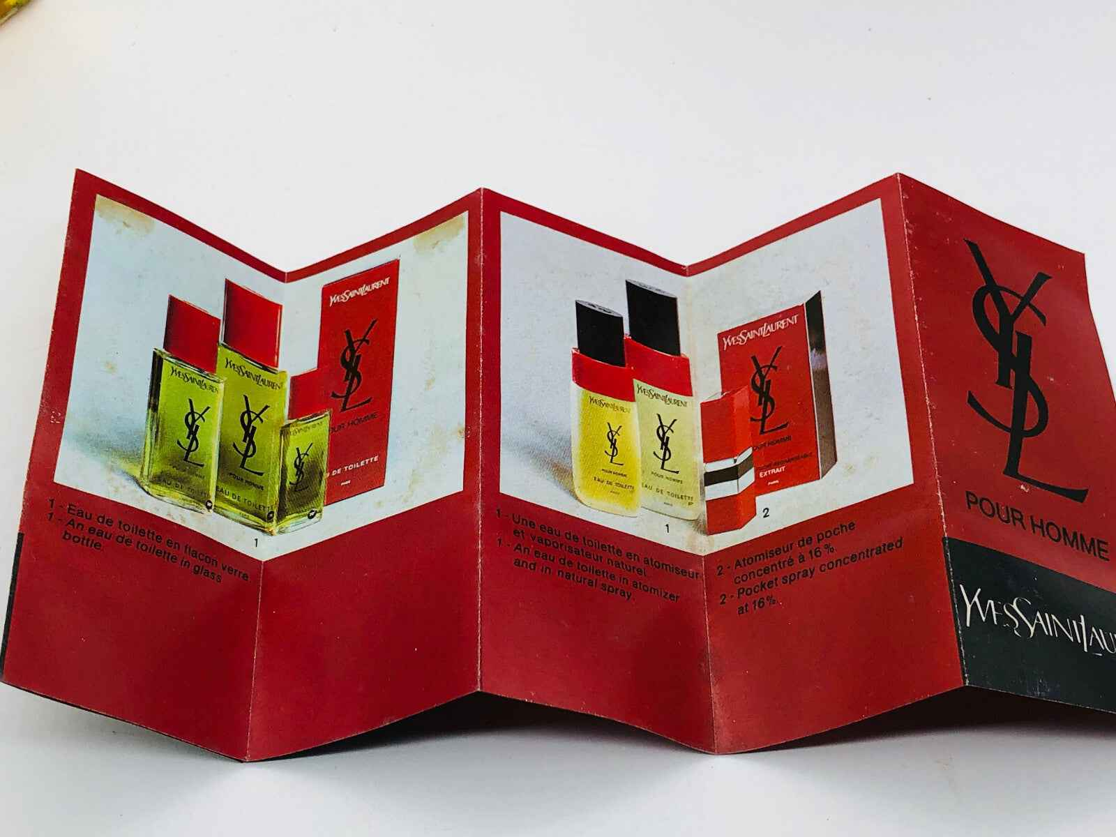 Catalogo di profumi YSL Pour Homme Vintage con flaconi e packaging di design distintivo