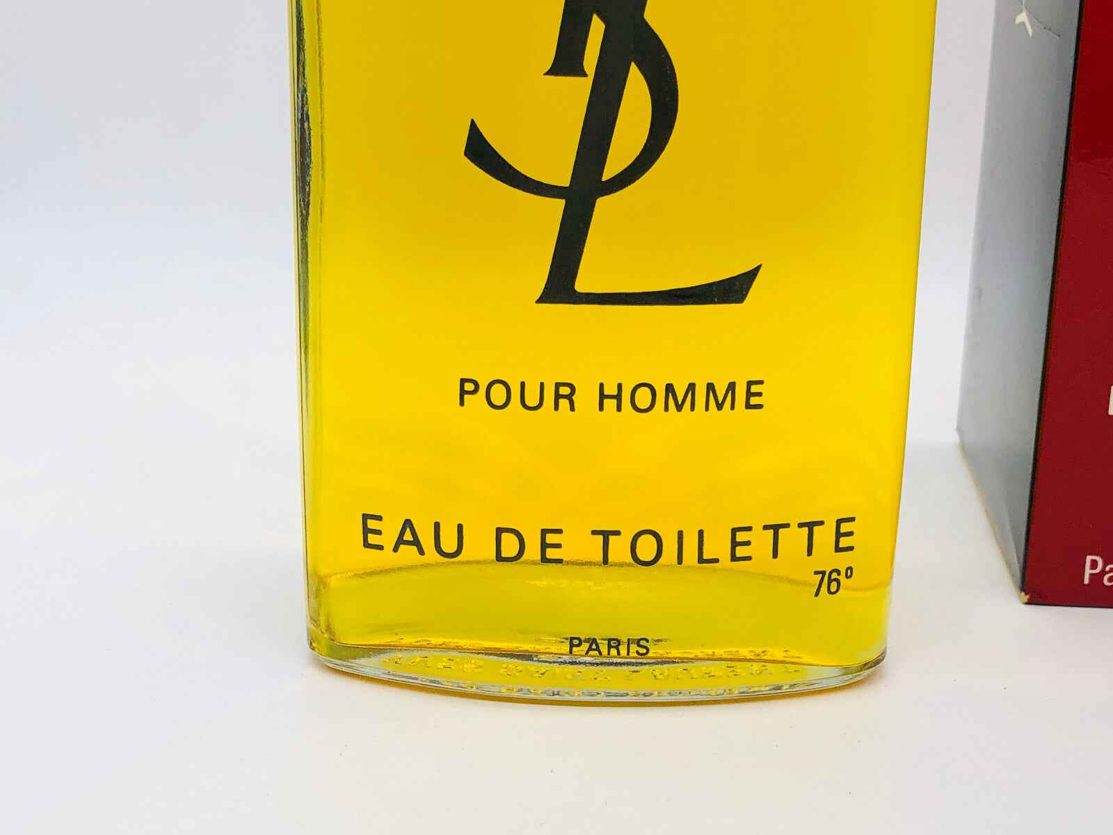 YSL Pour Homme Vintage Eau de Toilette con bottiglia gialla in vetro elegante