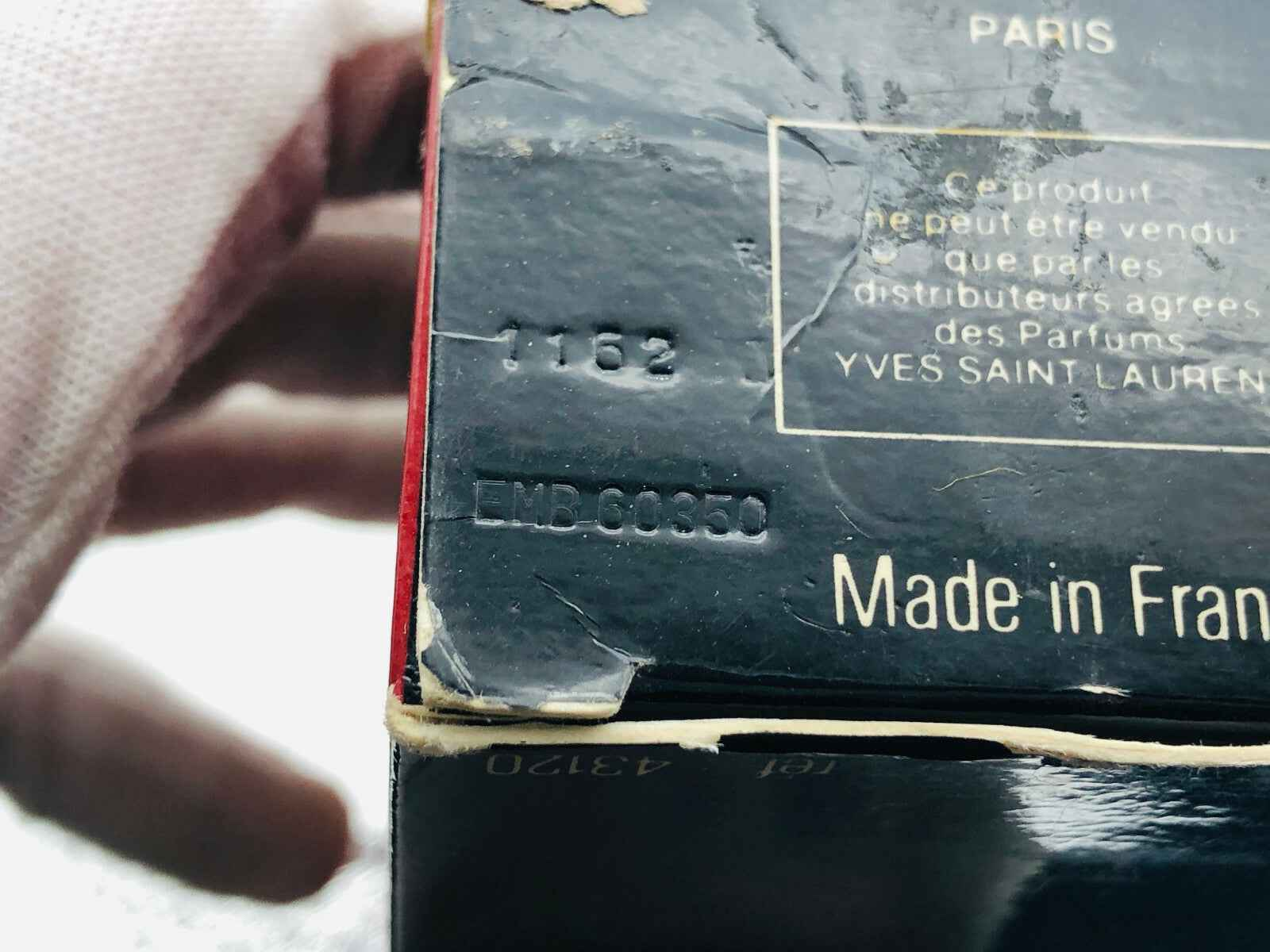 Confezione di Ysl Pour Homme Vintage con dettagli di produzione e codice a barre visibili