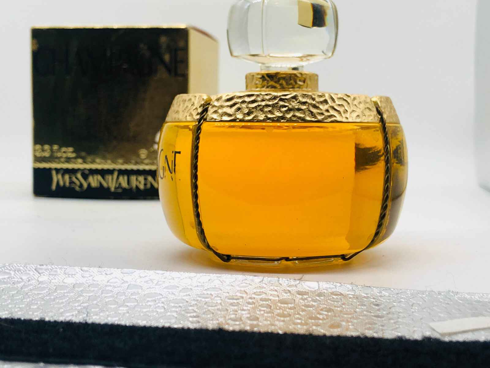 Profumo Champagne Ysl Vintage in flacone dorato con dettagli eleganti e confezione originale