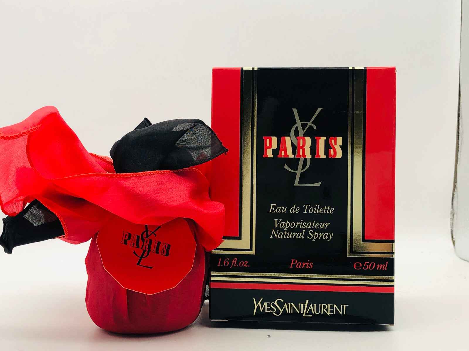 Profumo Vintage Ysl Paris con confezione rossa e nera, flacone da 50ml in stile elegante