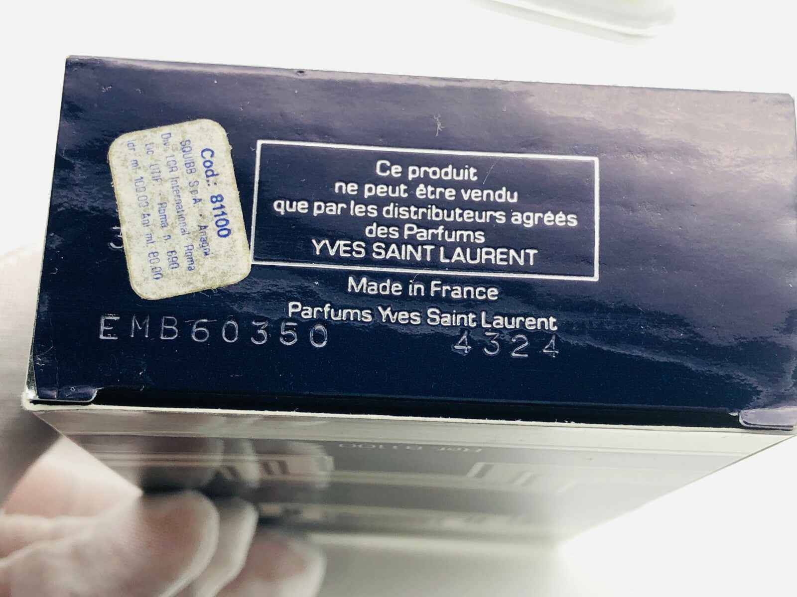Scatola del profumo Ysl Kouros Vintage di Yves Saint Laurent con dettagli del prodotto stampati