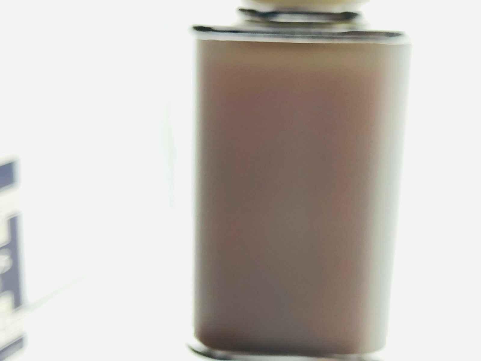 Flacone opaco di profumo Ysl Kouros Vintage con eleganza retrò e design distintivo