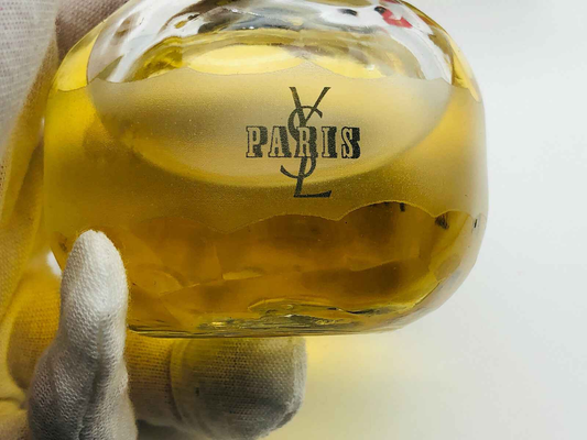 Flacone di profumo Ysl Paris con elegante design e aroma floreale, perfetto per ogni occasione