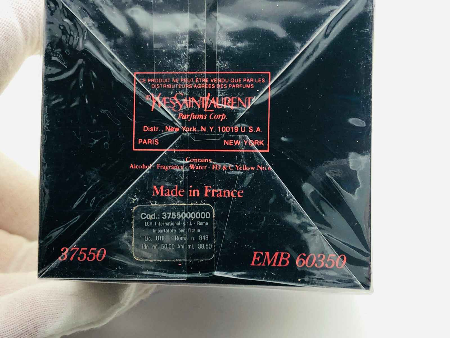 Confezione del profumo Ysl Paris Vintage con etichetta rossa e informazioni di prodotto sul retro
