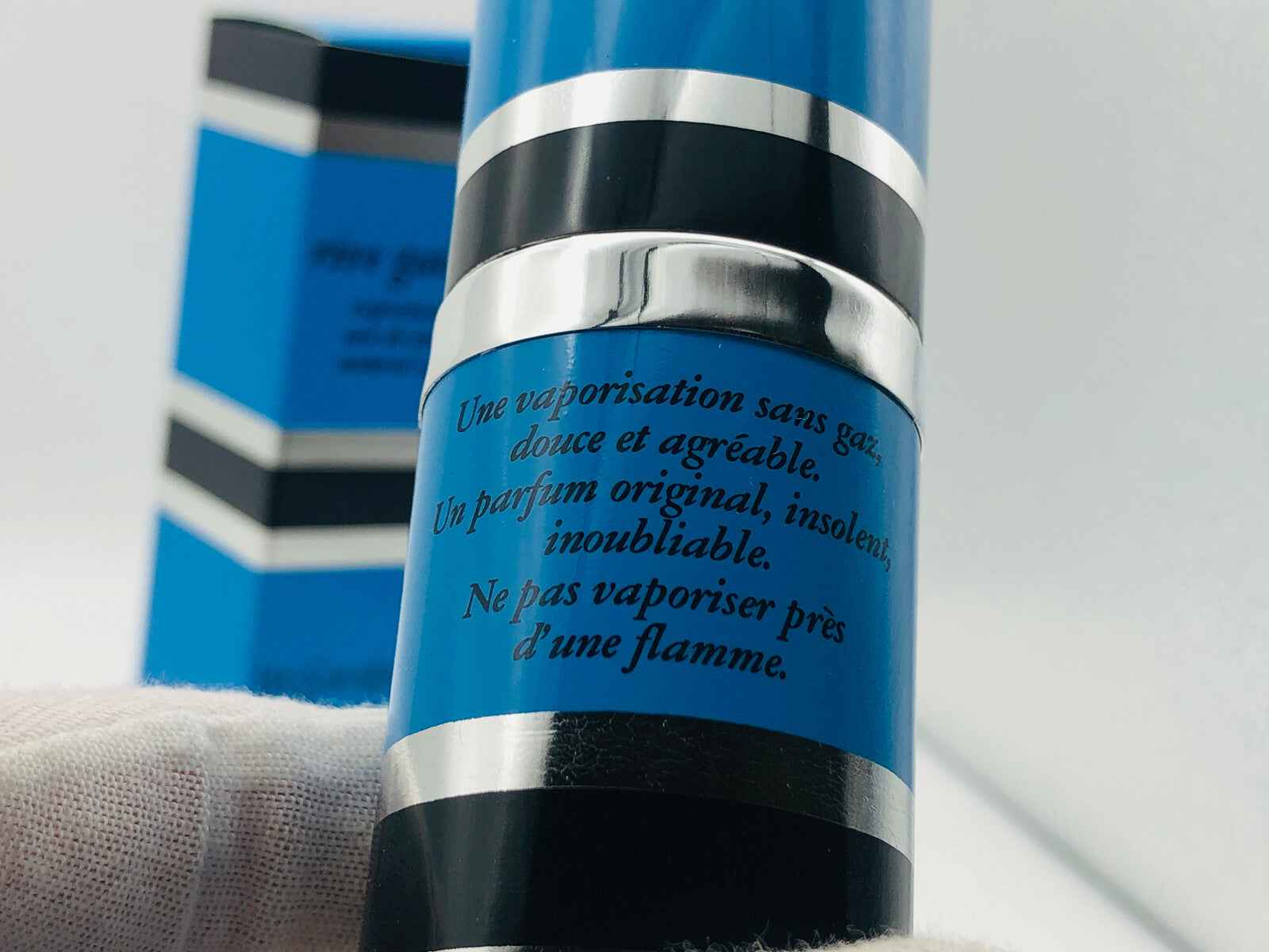 Flacone di profumo Ysl Rive Gauche Vintage con design blu e istruzioni sulla vaporazione