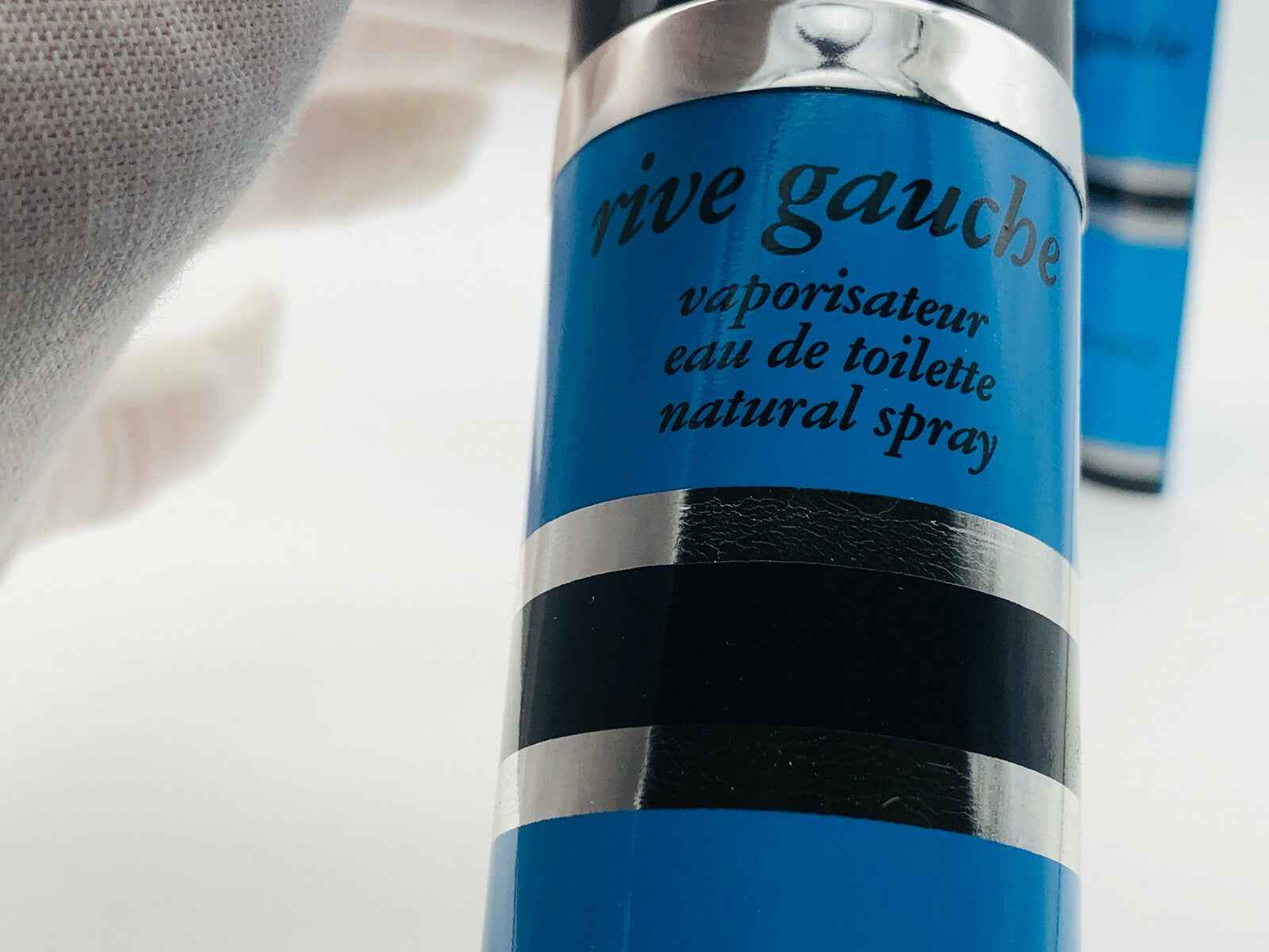 Flacone aerosol Yves Saint Laurent Ysl Rive Gauche Vintage con design blu e nero e spray naturale