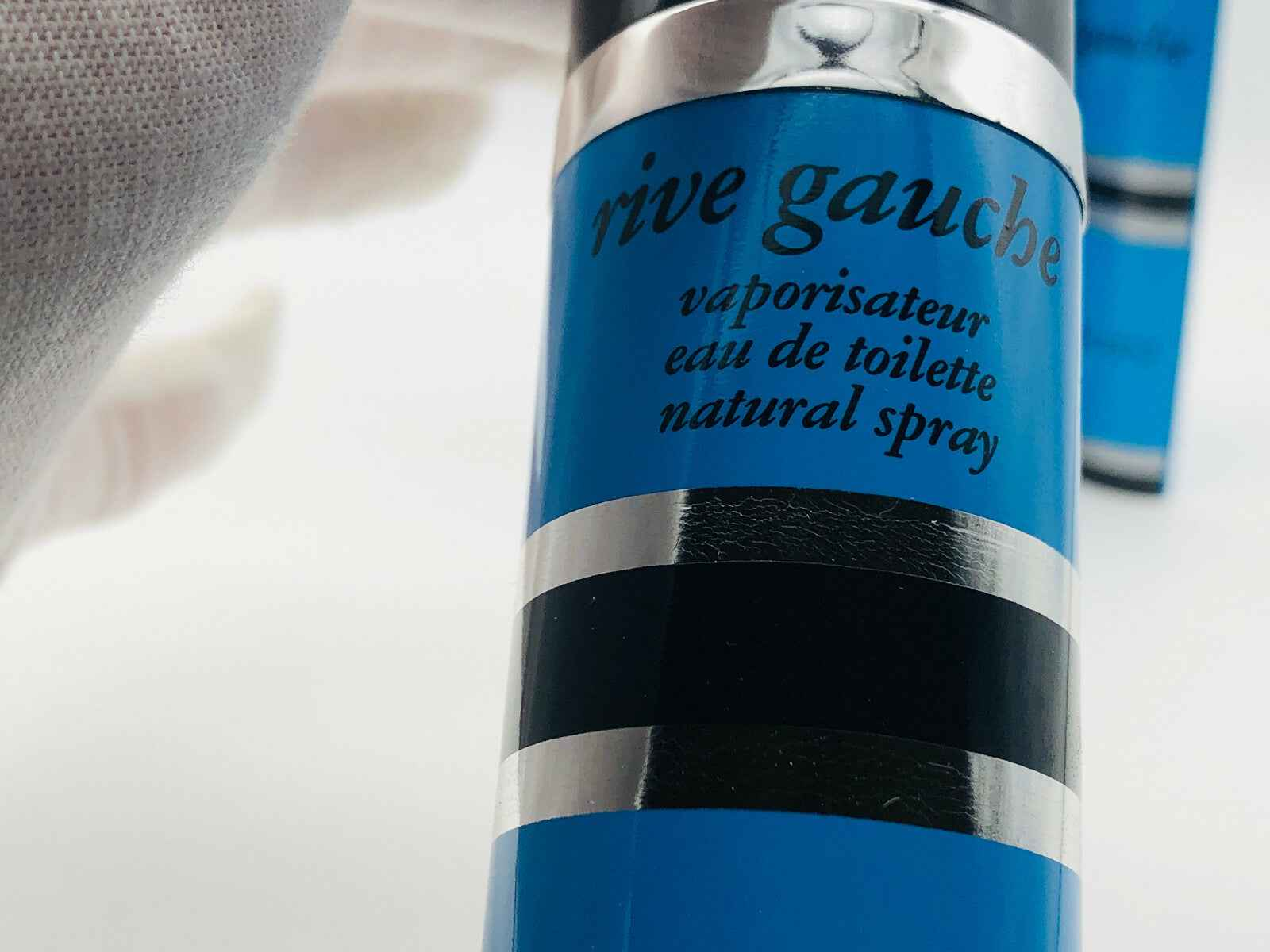 Flacone aerosol Yves Saint Laurent Ysl Rive Gauche Vintage con design blu e nero e spray naturale
